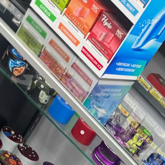 Disposable vape flavors stacked in the display case